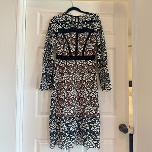 Elegant Black and White Patterned Dress